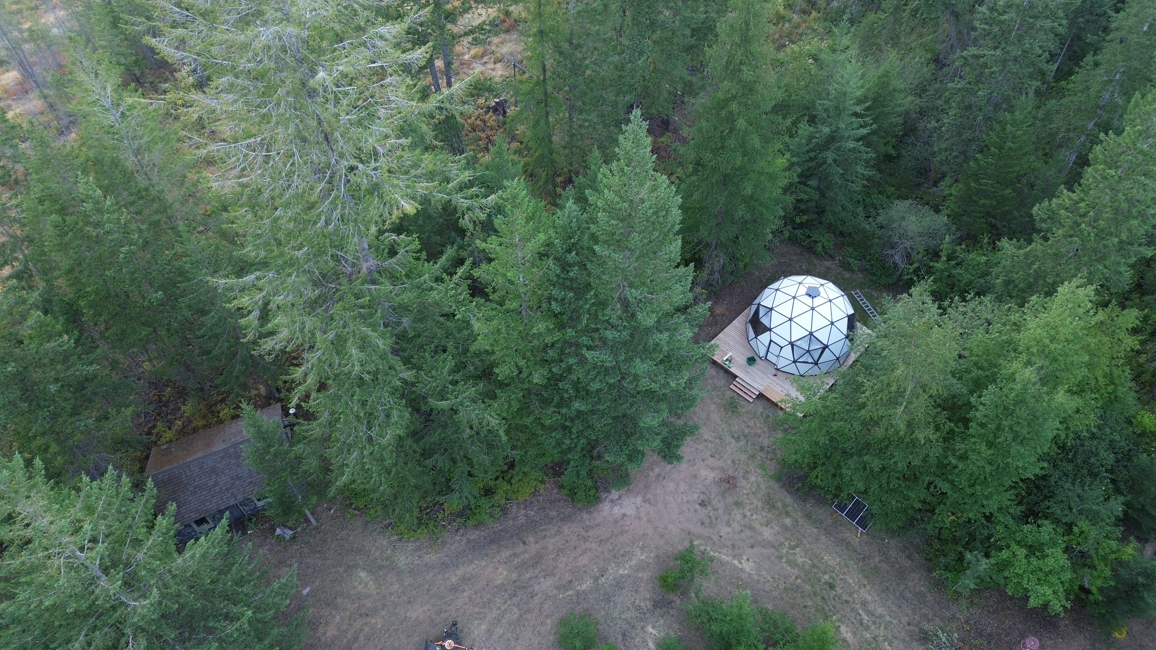 Aerial view of the dome and old cabin